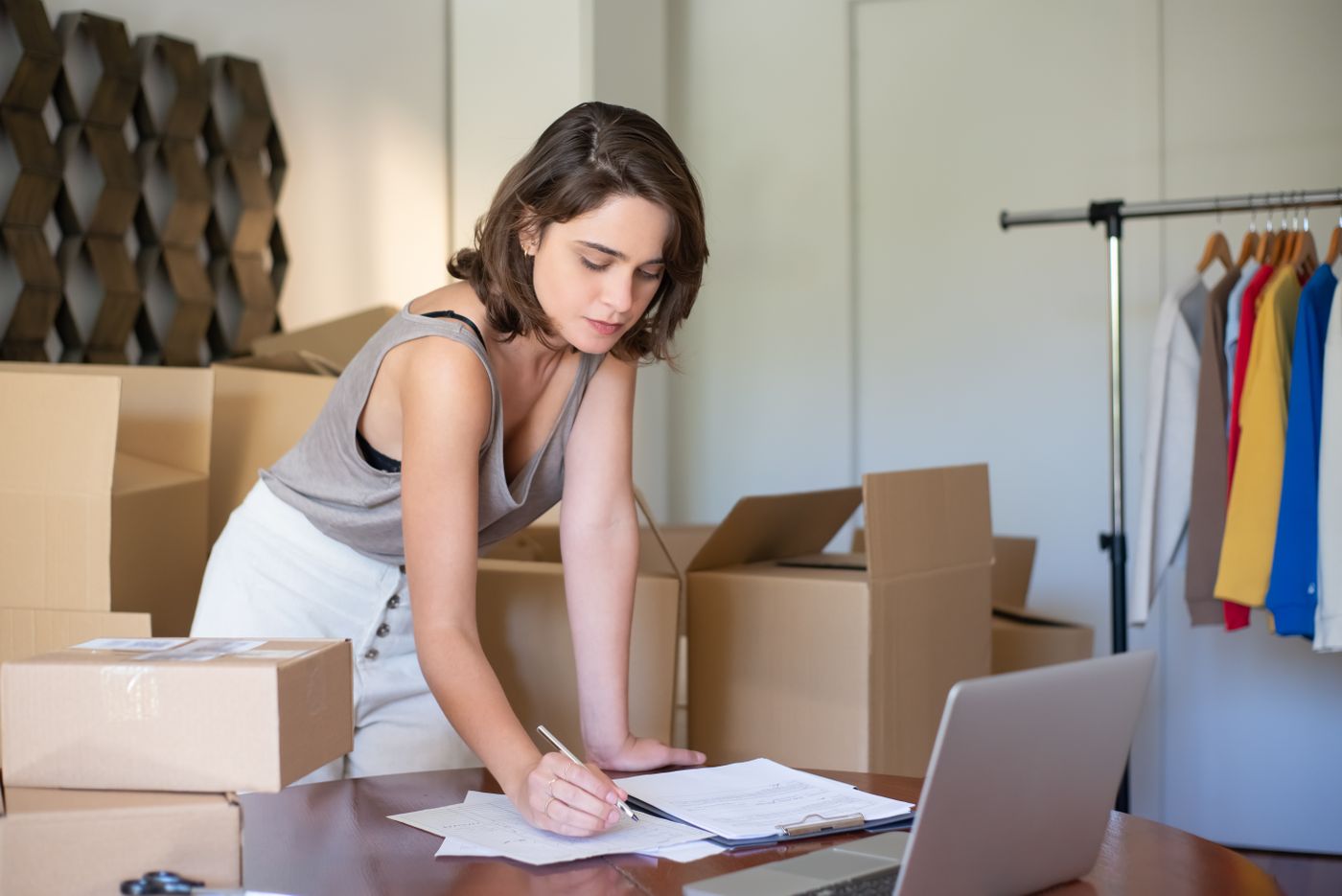 A small-business owner working calmly at their desk