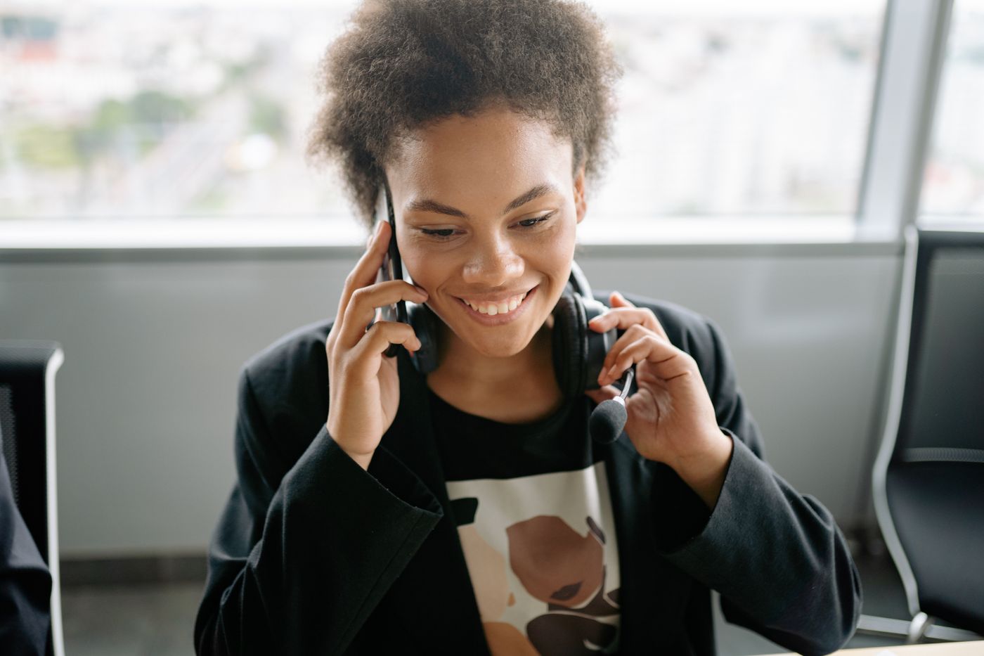 An AltaGrade support specialist mid-call, helping a customer